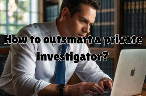 a private investigator focusing on his laptop